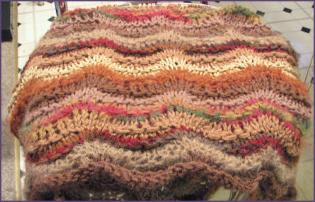 Multicolored brown ripple afghan in progress