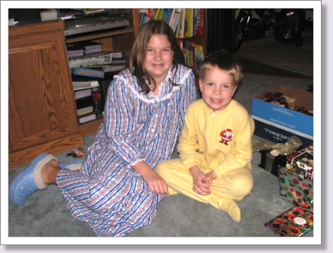 Two happy kiddos on Christmas morning